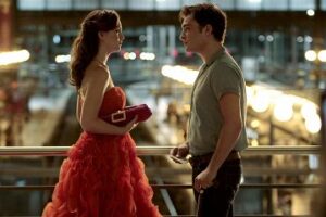 Imagem preta para episódio com Blair de vestido vermelho.